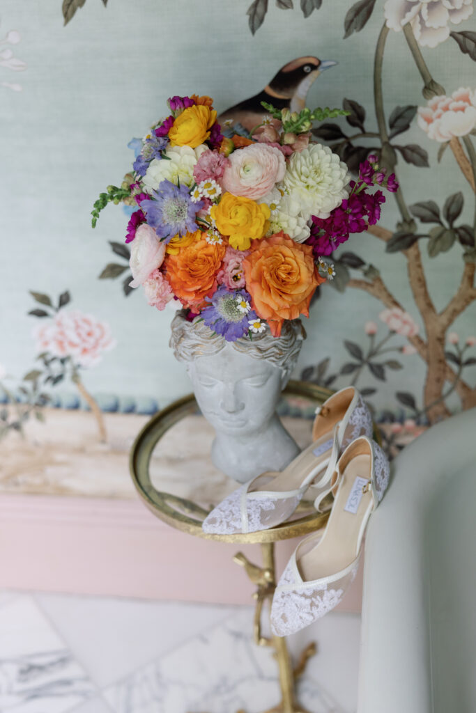Amanda and Sean's wedding invitation with colorful florals and bridal details at Barr Mansion.