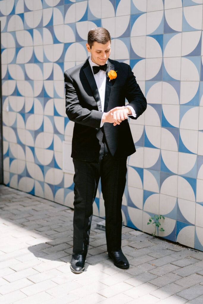 Pre-ceremony photoshoot of groom with day-of wedding coordination by Vanesa and Co Events.