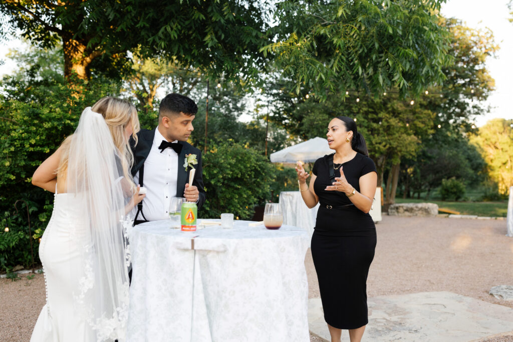 Bride and groom enjoying their wedding with a wedding day coordinator in Austin